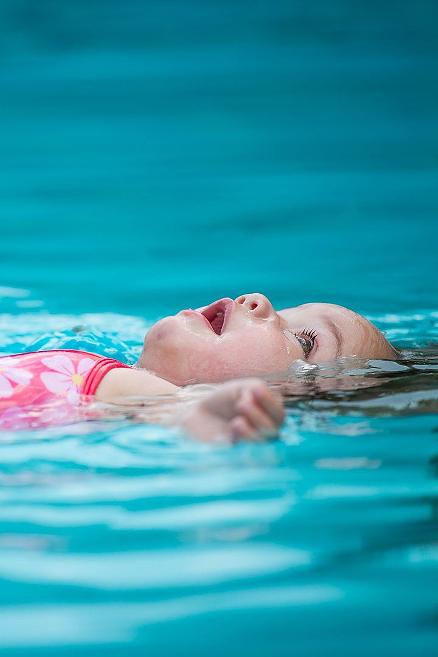 Baby and parent in the water